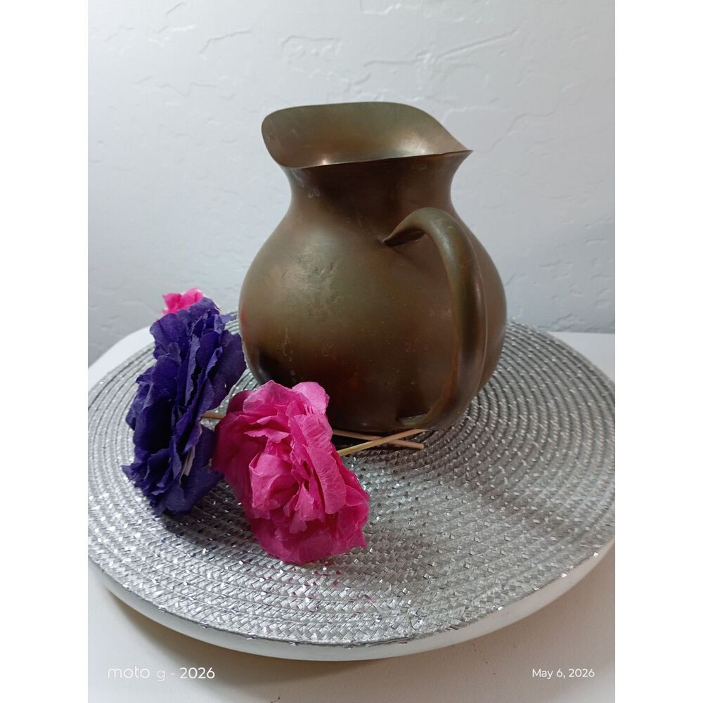 Vintage Solid Copper Pitcher features a distinct rounded shape
